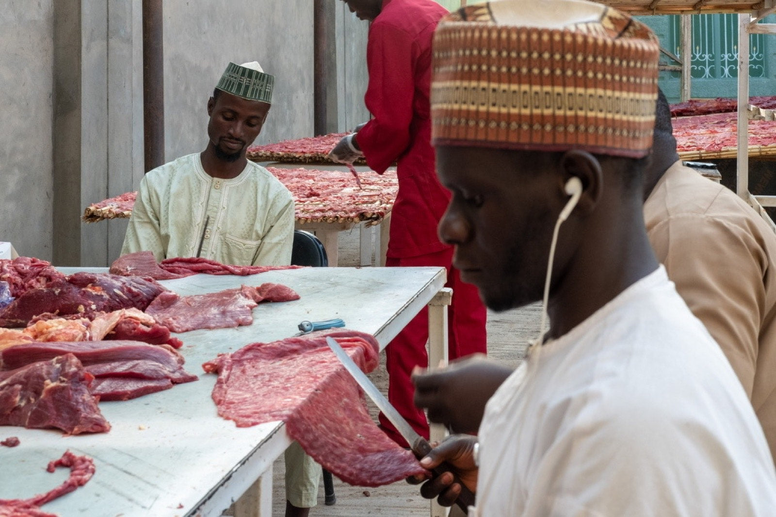 MOBKILISHI artisans filleting beef by hand at the Katsina production floor